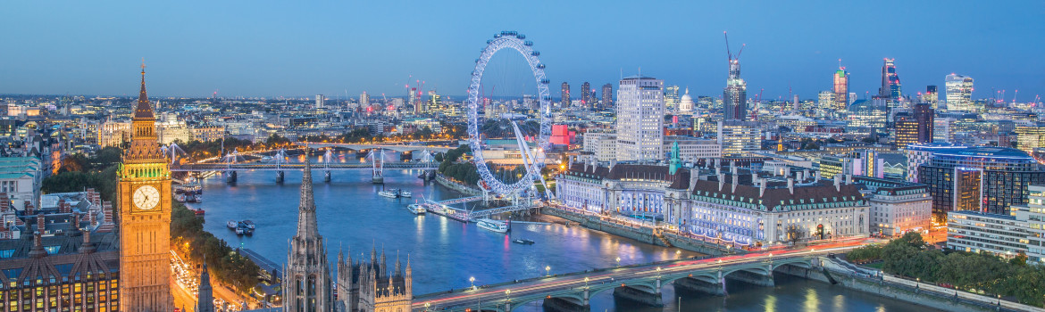 London skyline with Big ben and the London Eye at dusk. Photo Credit: © Julian Love/Visit London Images.