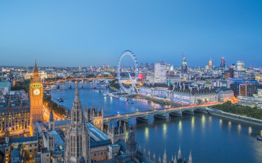 London skyline with Big ben and the London Eye at dusk. Photo Credit: © Julian Love/Visit London Images.