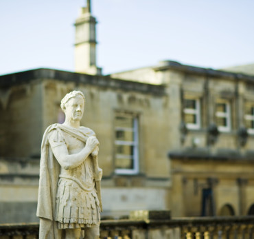 Bath - A close up of a statue outside the Roman Baths, a World Heritage site, at Bath in Somerset., Bath, Bath and North East Somerset, England.