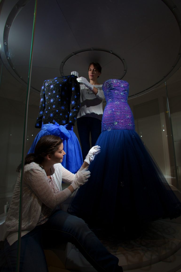 Kensington Palace - Conservators put the finishing touches to an Evening dress by Murray Arbeid, 1986 as worn by Diana, Princess of Wales.