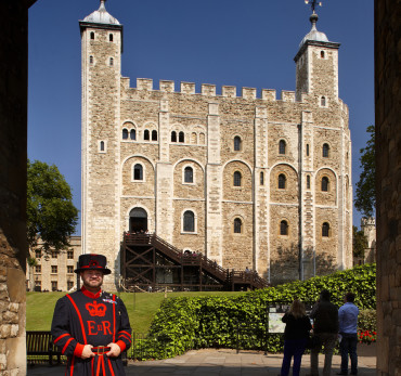 Tower of London - White Tower and Yeoman Warder Shedden. The White Tower was the original Tower of London. Begun by William the Conqueror around 1080, it would have made a safe and impressive home for the newly crowned Norman invader. During its long life - it is almost as old as the Millennium - it has served many purposes including Royal residence, Royal Observatory, Public Records Office, State Prison, gunpowder store and is still home to the Royal Armouries.