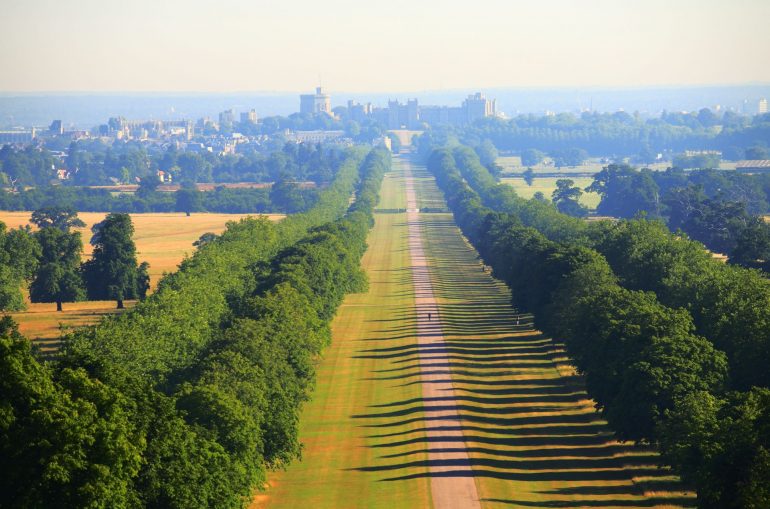 The Long Walk towards Windsor Castle in the distance. The Long Walk was commenced by Charles II from 1680-1685 by planting a double avenue of elm trees. The central carriage road was added by Queen Anne in 1710. It is a little less than three miles long. To the south of Windsor is The Great Park extending over some 14,000 acres of which 8,000 acres are forest. The public areas are predominantly woodland or open grassland.