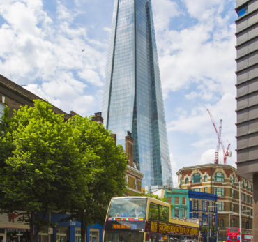 London Architecture - View of The Shard from Tooley Street with sightseeing bus. Photo Credit: ©Visit London Images.