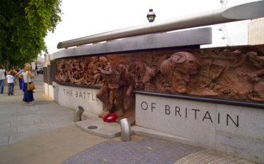 The Battle of Britain Monument on Victoria Embankment in London, designed by Paul Day the bronze plaques dramatically depict RAF crewmen scrambling into action. Photo Credit: ©Visit London Images.