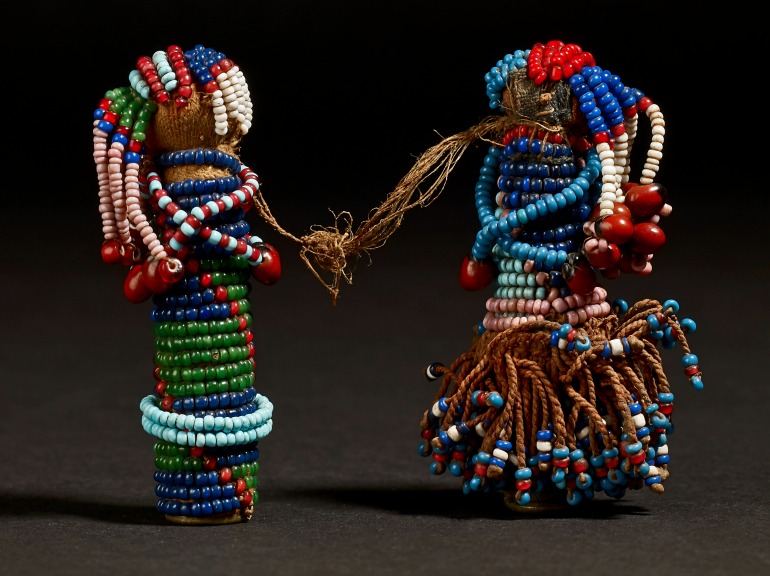 Pair of Sotho Gun Cartridge Dolls, Glass, brass and leather, South Africa, late 19th Century. Photo Credit: © British Museum.