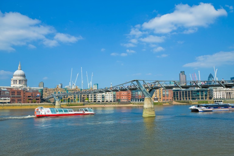 The once wobbly Millennium bridge over the Thames looking towards St. Paul's Cathedral. Photo Credit: ©Visit London Images.