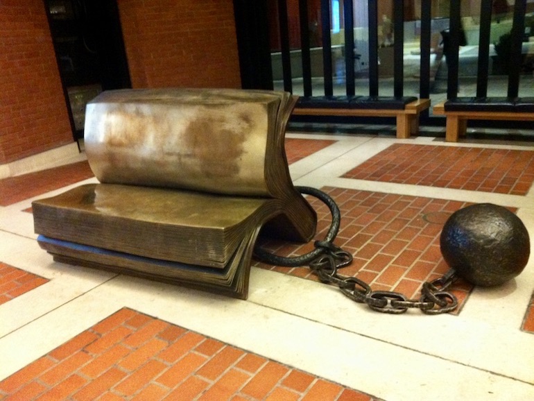 British Library in London: Sitting on History (1995) sculpture by Bill Woodrow. Photo Credit: © Ursula Petula Barzey. 
