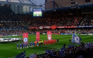 London Football: View from the West Stand of Stamford Bridge during a Champions League game. Photo Credit: © Brian Minkoff via WikiMedia Commons.