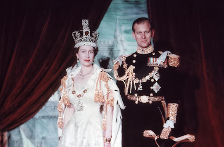 Prince Philip & Queen Elizabeth II wearing the Imperial State Crown after Coronation. Photo Credit: © Public Domain via Wikimedia Commons.