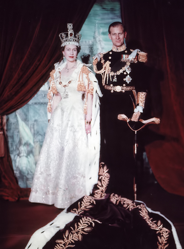 Prince Philip & Queen Elizabeth II wearing the Imperial State Crown after Coronation. Photo Credit: © Public Domain via Wikimedia Commons.