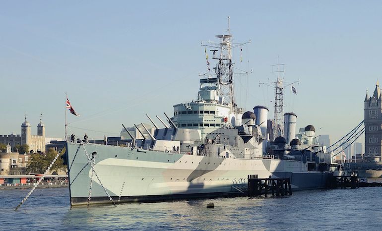 HMS Belfast on River Thames in London. Photo Credit: © Alvesgaspar via Wikimedia Commons.