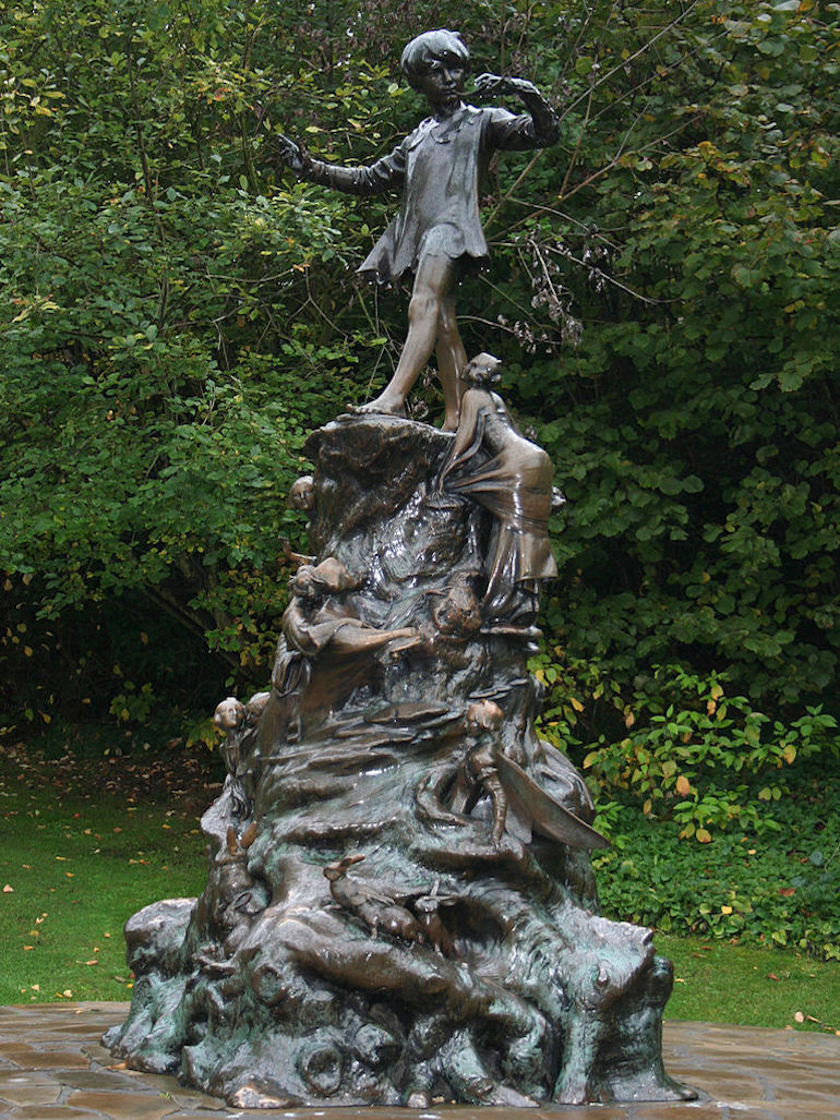 Peter Pan Monument in Kensington Gardens in London. Photo Credit: © Peter Clarke via Wikimedia Commons.