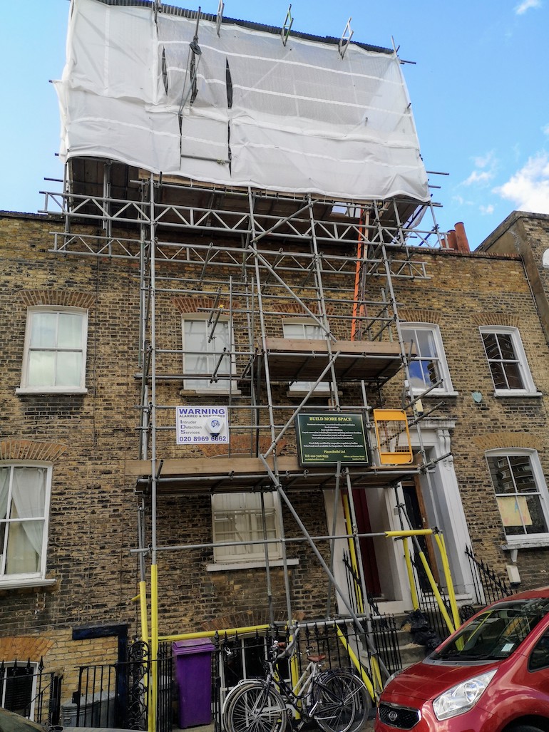 Scaffolding on Chisenhale Road, Bow, East London. Photo Credit: © Steve Fallon.