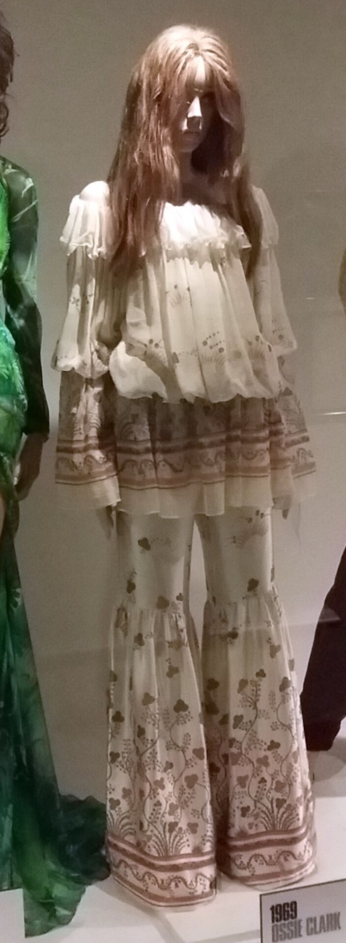Ossie Clark satin and chiffon trouser suit in Botticelli print, 1969. Photo Credit: © Mabalu via Wikimedia Commons.