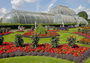 The Palm House and Parterre at the Royal Botanic Gardens of Kew in London. Photo Credit: © Daniel Case via Wikimedia Commons.