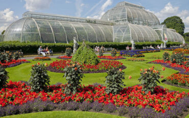 The Palm House and Parterre at the Royal Botanic Gardens of Kew in London. Photo Credit: © Daniel Case via Wikimedia Commons.