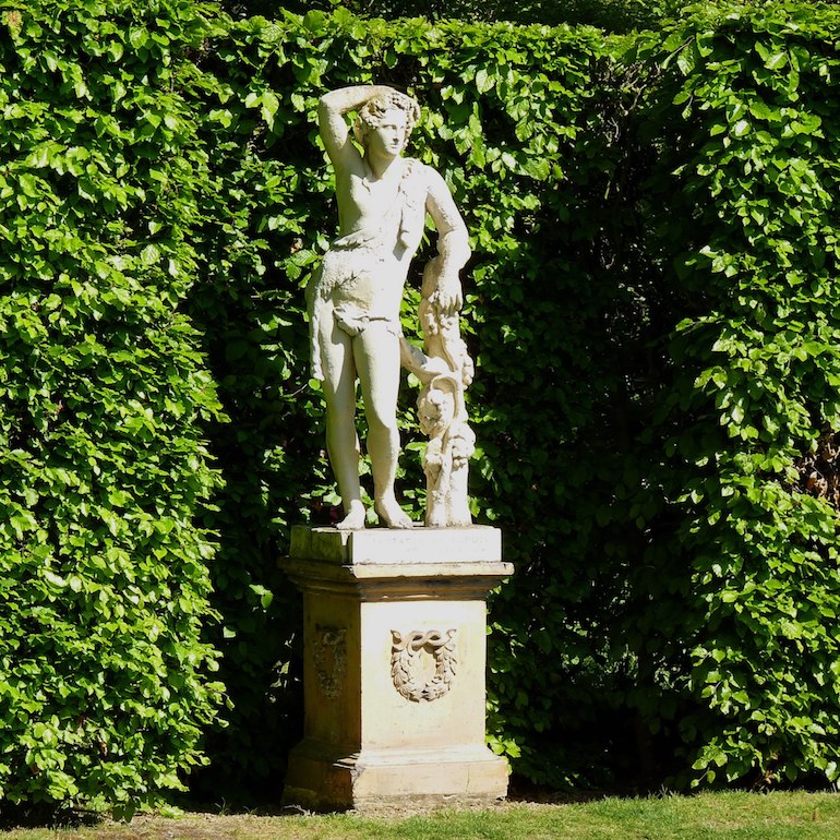 Statue in Sissinghurst Castle Gardens. Photo Credit: © Hans Bernhard via Wikimedia Commons.