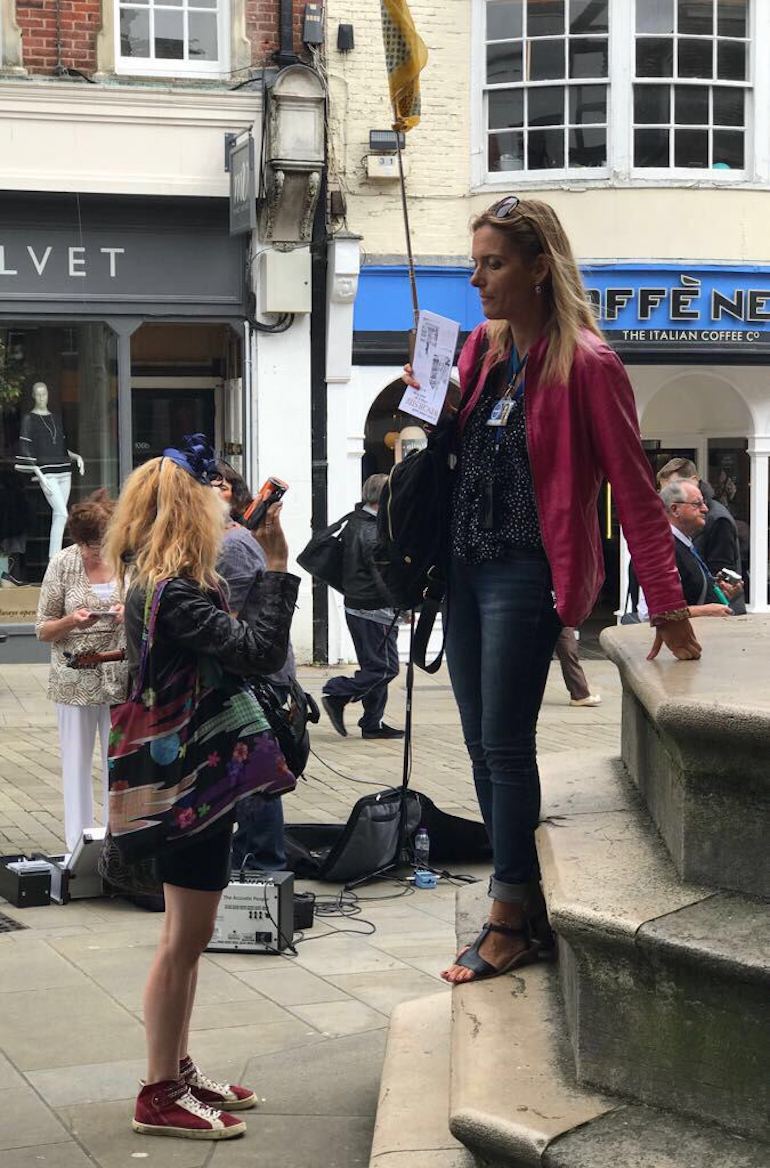 Blue Badge tourist guide Olga Romano speaks to a group of tourists in Chester City Centre. Photo Credit: © Olga Romano.