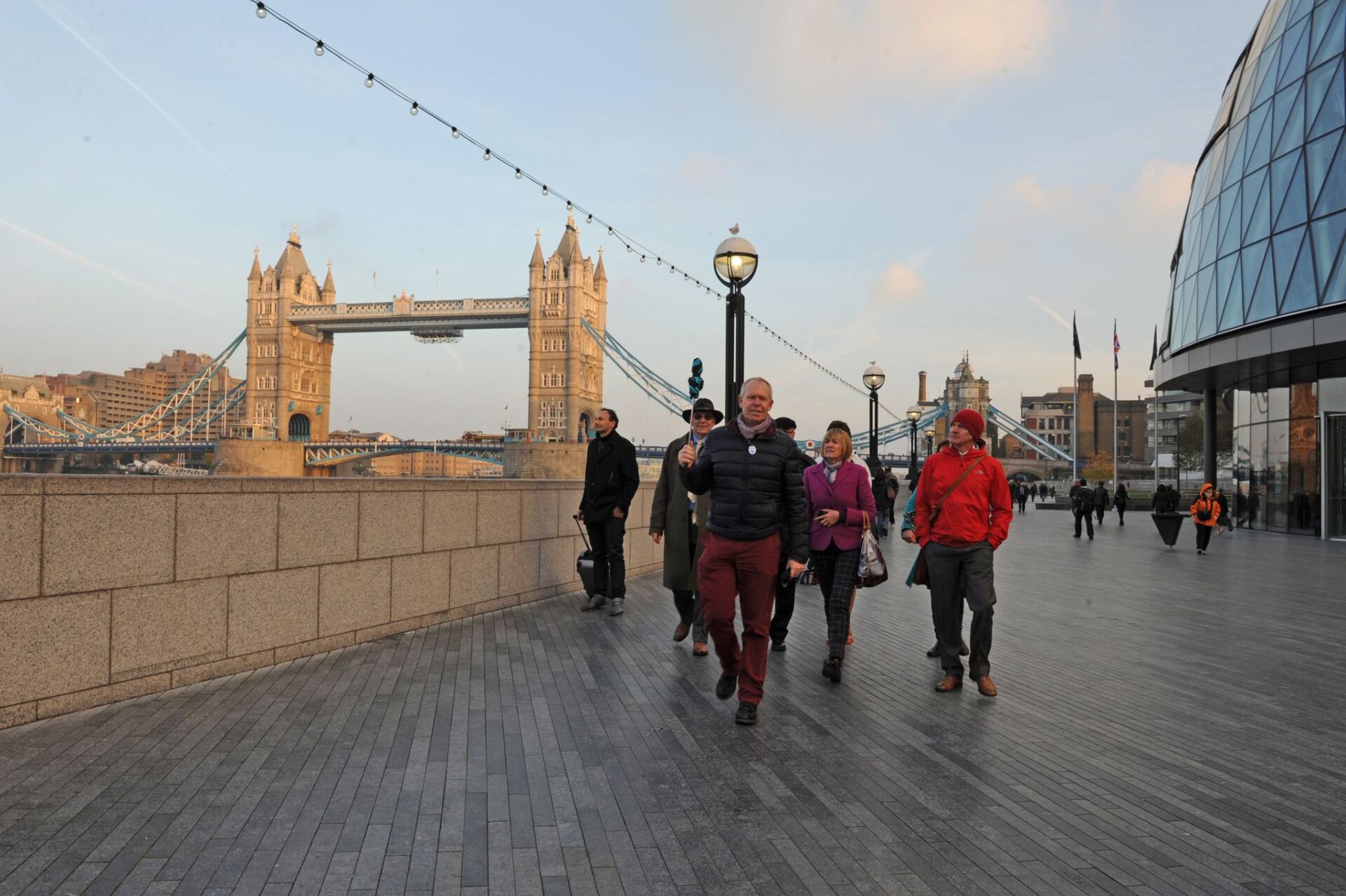 Blue Badge Tourist Guides in action near Tower Bridge.