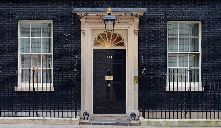 Number 10 Downing Street is the headquarters and London residence of the Prime Minister of the United Kingdom. Photo Credit: © Sergeant Tom Robinson RLC / Ministry of Defence via Wikimedia Commons. 