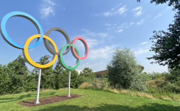 Queen Elizabeth Olympic Park_Olympic Rings with velodrome in distance. Photo Credit: © Sarah Wood.