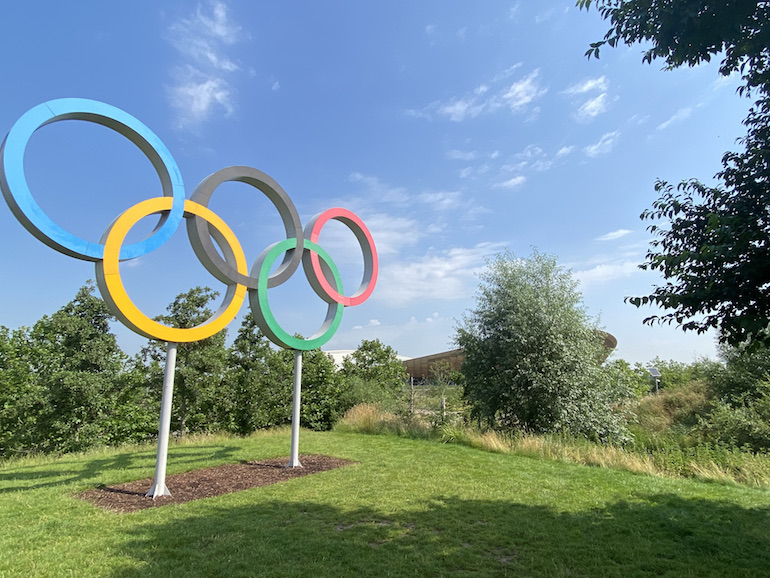 Queen Elizabeth Olympic Park_Olympic Rings with velodrome in distance. Photo Credit: © Sarah Woods. 