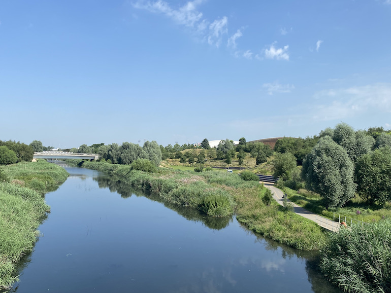 River Lea velodrome in distance at Queen Elizabeth Olympic Park. Photo Credit: © Sarah Woods. 