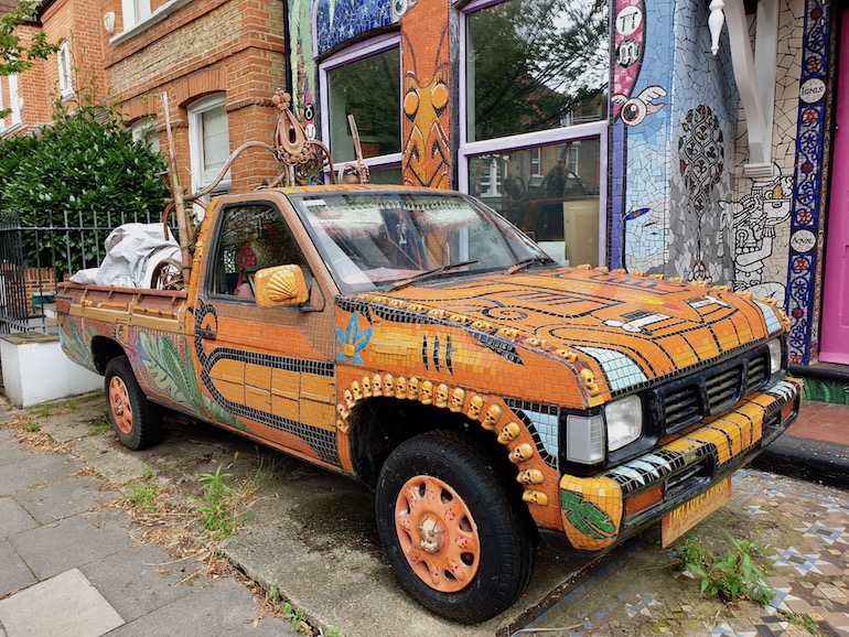 Pickup in front of the Carrie Reichardt Mosaic House, Chiswick area of London. Photo Credit: © Christopher Hayden.