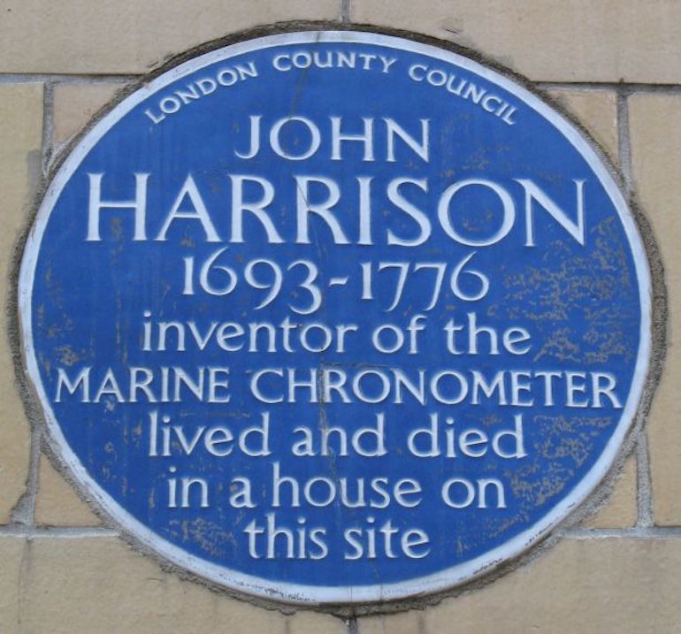 Blue plaque remembering John Harrison is located on the south side of 11 Red Lion Square, Holborn, London. Photo Credit: © Micronanopico via Wikimedia Commons. 