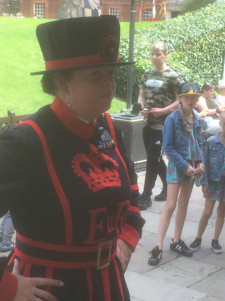 Yeoman Warder aka Lady Beefeater Amanda Clark at Tower of London. Photo Credit: © Edwin Lerner. 