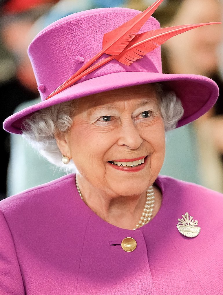 Queen Elizabeth the ll during her 2015 visit to HMS Ocean in Devonport. Photo Credit: © Joel Rouse/ Ministry of Defence via Wikimedia Commons.