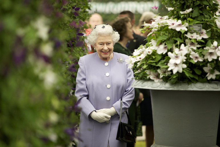 Queen Elizabeth II arriving at the 2012 RHS Chelsea Flower Show. Photo Credit: © Andy Paradise via Wikimedia Commons.