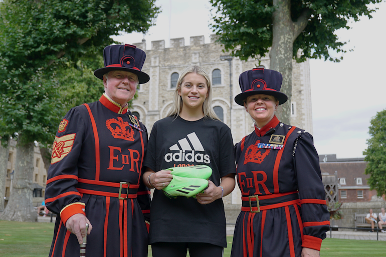 English footballer Alessa Russo with Yeomen Warders at the Tower of London. Photo Credit: © Historic Royal Palaces.