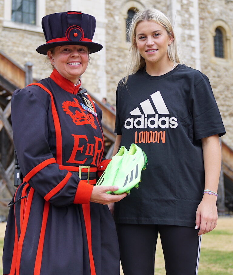 English footballer Alessa Russo with Yeomen Warders at the Tower of London. Photo Credit: © Historic Royal Palaces.