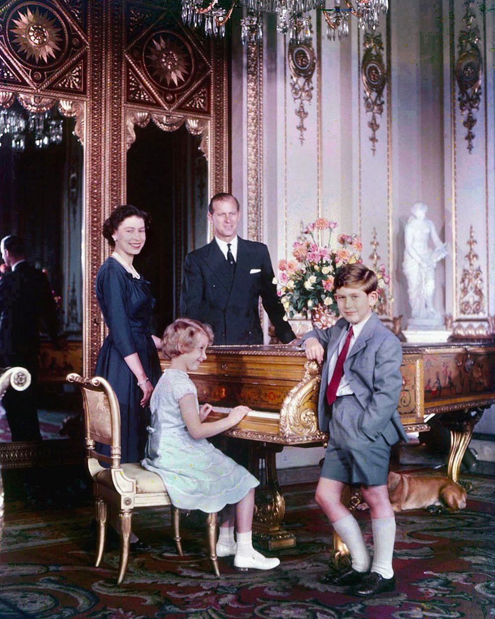 Prince Charles with his parents and sister Princess Anne, October 1957. Photo Credit: © Library and Archives Canada, e010949328 / Bibliothèque et Archives Canada, e010949328 via Wikimedia Commons.