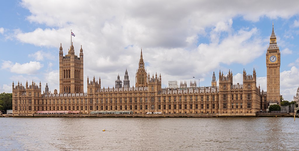 Palace of Westminster, Big Ben, and Westminster Bridge as seen from the south bank of the River Thames. Photo Credit: © Terry Ott via Wikimedia Common.