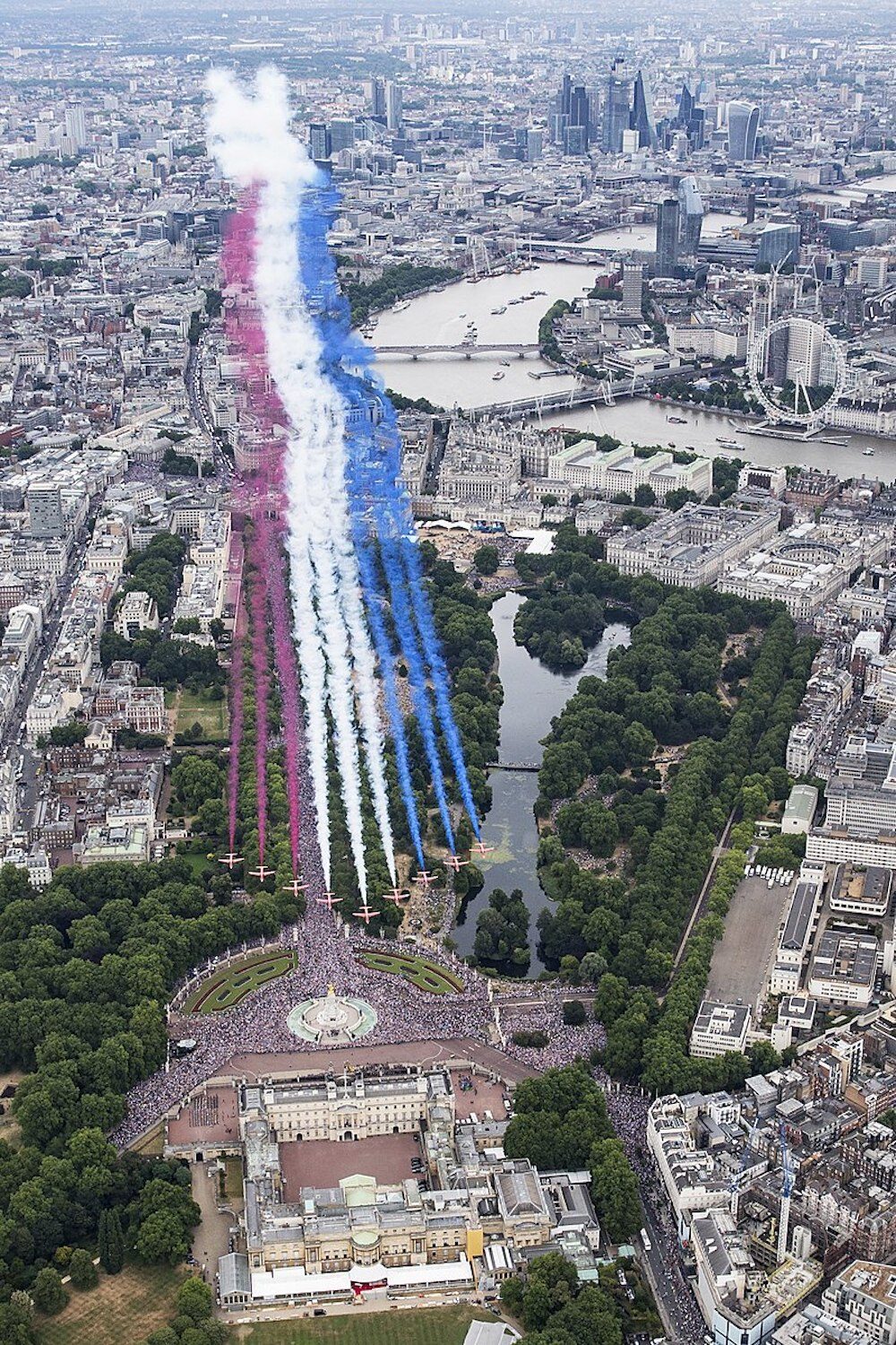 Red Arrows taking part in the RAF100 parade and flypast over London. Photo Credit: © Cpl Tim Laurence RAF/MOD via Wikimedia Commons.